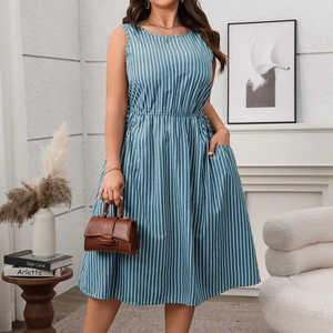 Detail of blue and white striped sleeveless dress featuring elastic waist and side pockets