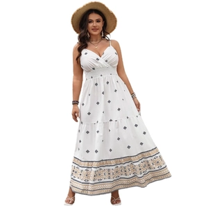 Bohemian white maxi dress with deep V-neck and geometric print for summer vacation