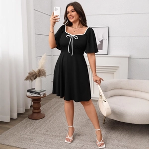 Black plus size square neck dress with white bow detail and stylish flared short sleeves