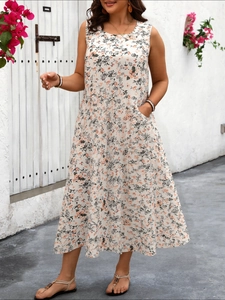 Close-up detail of sleeveless floral maxi dress with side pockets and orange flower prints