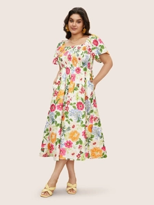 Detail of square neckline and floral print on women's plus size summer maxi dress