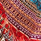 Close-up of bohemian printed fabric with intricate geometric and tribal patterns
