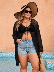 Detail shot of black crochet hollow-out long cardigan for women summer beachwear