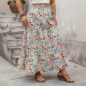 Jupe longue bohème à fleurs avec taille haute élastique et volants étagés pour l'été