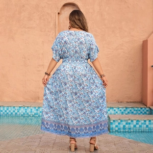 Women's light blue floral maxi dress with bohemian print and V-neck for summer vacations