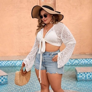 Chic white hollow lace knit cover-up top with long sleeves for summer beach vacation