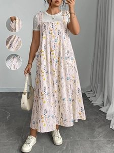 Détails de la robe longue fleurie avec poches latérales et bretelles nouées ajustables