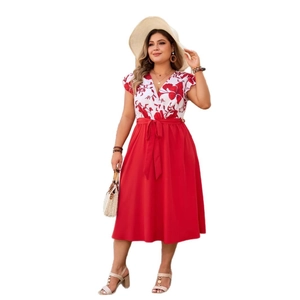 Plus size summer dress with floral V-neck top and a solid red flared skirt with belt