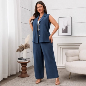 Chic dark blue two-piece set with sleeveless button vest and wide-leg trousers for women