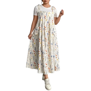 Robe d'été grande taille blanche à fleurs avec nœuds d'épaule et silhouette trapèze
