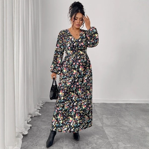 Floral print maxi dress with V-neck and puff sleeves in black with colorful patterns