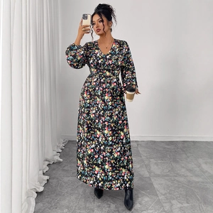 Elegant V-neck floral maxi dress with puff sleeves and high waist slimming silhouette