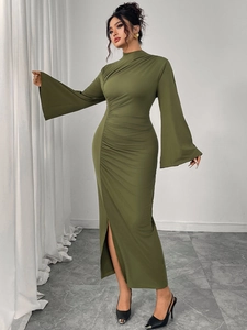Detail of dark green ruched maxi dress with flared sleeves and stylish side slit