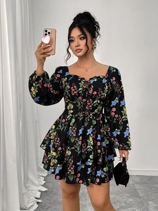 Detail of sweetneck floral mini dress featuring tiered ruffles and elastic cuffs