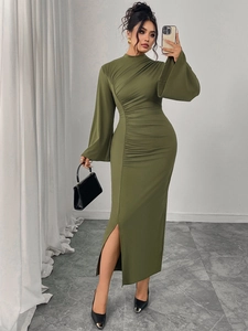 Detail view of olive green midi dress with ruched waist and high slit design