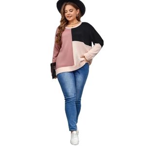 Women's crewneck knit sweater featuring stylish pink, black, and beige geometric color blocks