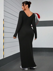 Slim fit black ribbed knit long sleeve maxi dress with back deep V-neckline
