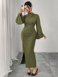 Detail view of olive green ruched dress featuring elegant bell sleeves and side slit design