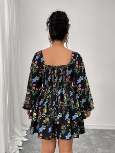 Floral print mini dress with smocked back design and layered ruffle hemline detail