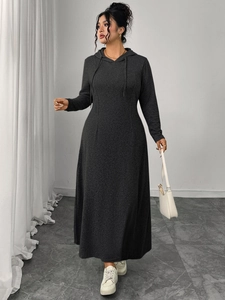 Detail of dark grey hooded maxi dress featuring a slim fit waist and soft knit texture