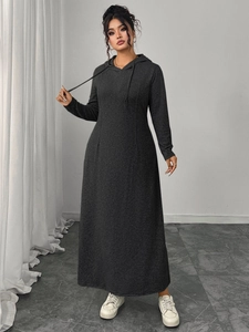 Detail of soft dark grey knit drawstring hood and neckline on long sleeve dress