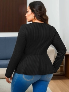 Elegant black peplum long sleeve top with textured vertical ribbing for women