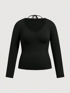 Slim fit black long sleeve top with square neck, halter neck ties and corset seams