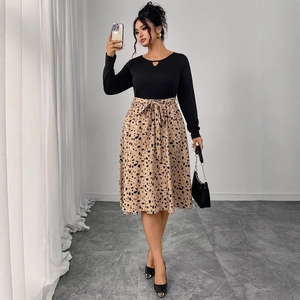 Elegant women's long sleeve black top and leopard print midi dress with waist tie