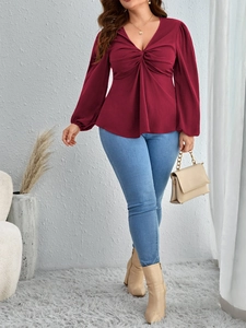 Women's plus size deep red V-neck long sleeve blouse with elegant front twist knot detail