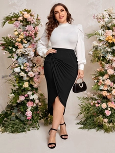 Elegant plus size high waist black slit skirt with white long sleeve top and handbag
