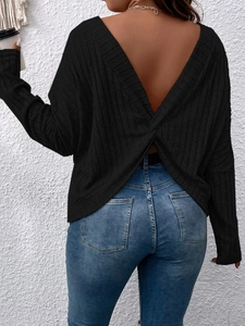 Women's black long sleeve knit top with deep V-back and stylish cross knot detail