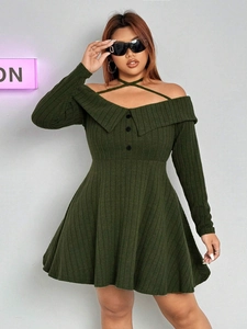 Close-up of off-shoulder dark green ribbed knit dress with collar and button details