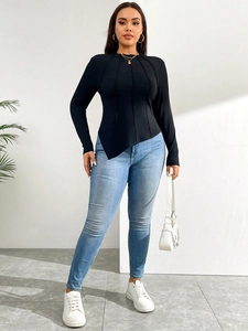 Slim fit black long sleeve top with asymmetric hem and decorative vertical stitching