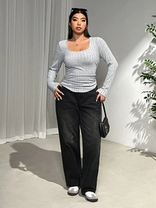 Slim fit grey ribbed long sleeve T-shirt with U-neck and black straight-leg jeans