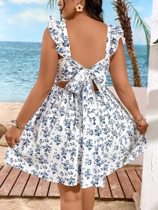 Blue and white floral vacation dress with backless bow tie and ruffle sleeves