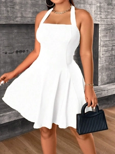 Elegant white halter neck A-line mini dress with sleeveless design for summer fashion