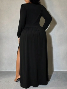 Elegant black long-sleeved split maxi dress for women showing model back view