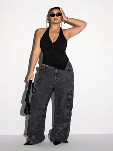 Chic black halter neck top with V-neck twist design and asymmetrical hem for women