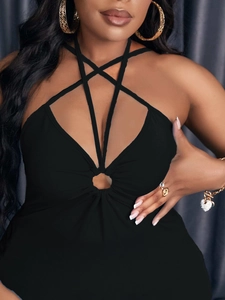 Slim fit black bodycon dress with sexy star-shaped cross straps and cutout halter neckline