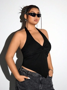 Plus size black halter neck top with twist knot detail and irregular hem design
