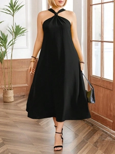 Elegant black halter neck A-line midi dress for women featuring a minimalist summer style