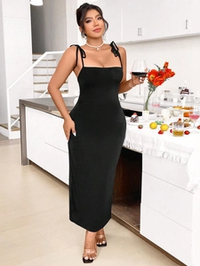 Elegant black backless knit maxi dress with thin shoulder straps for summer vacation