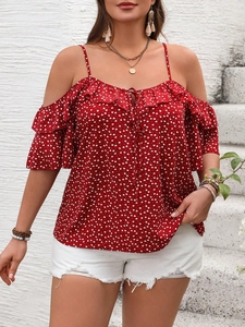 Red cold-shoulder top with white heart patterns and elegant layered ruffle sleeves