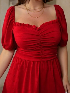 Elegant red V-neck dress for women with ruched chest details and puff sleeves in slim fit
