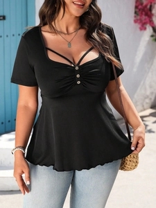 Elegant plus size black peplum top with sweetheart neckline and crisscross detail