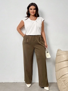 Sleeveless white chiffon top with V-neck pleats and olive green wide-leg trousers set
