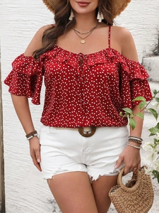 Red off-shoulder summer top with white heart print and ruffled trim for a vacation look