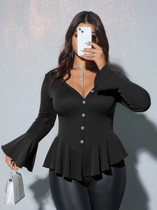 Slim fit black V-neck top with peplum hem and buttoned long sleeves in ribbed knit
