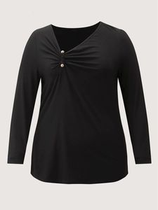 Women's black V-neck long sleeve shirt with ruched chest and gold button details