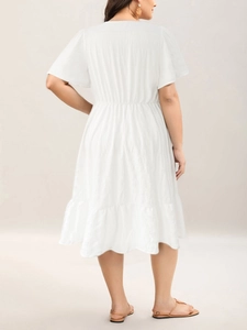 White plus size V-neck short sleeve dress with crinkle fabric and ruffle hem
